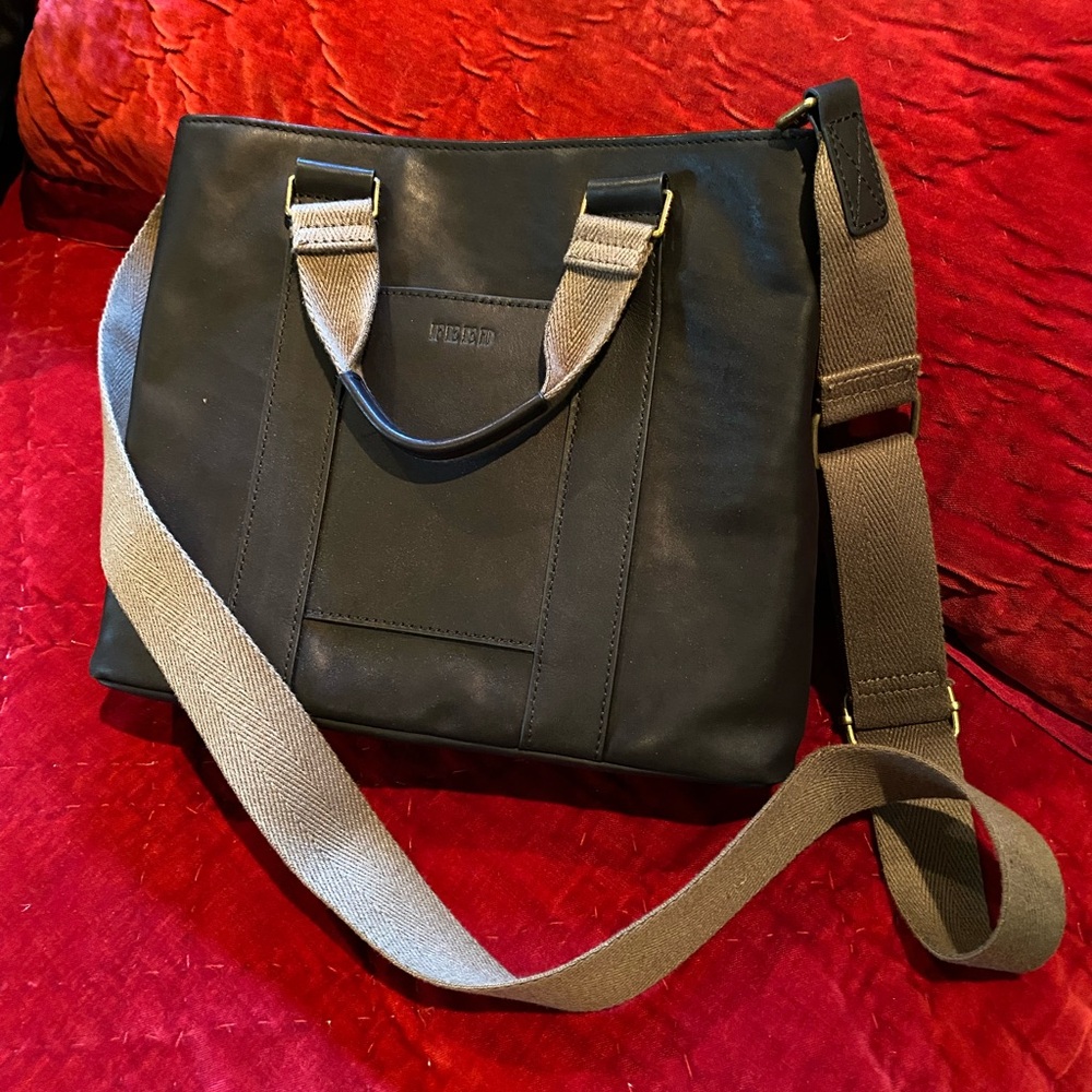 Elegant Black Crossbody Bag with Tan Strap